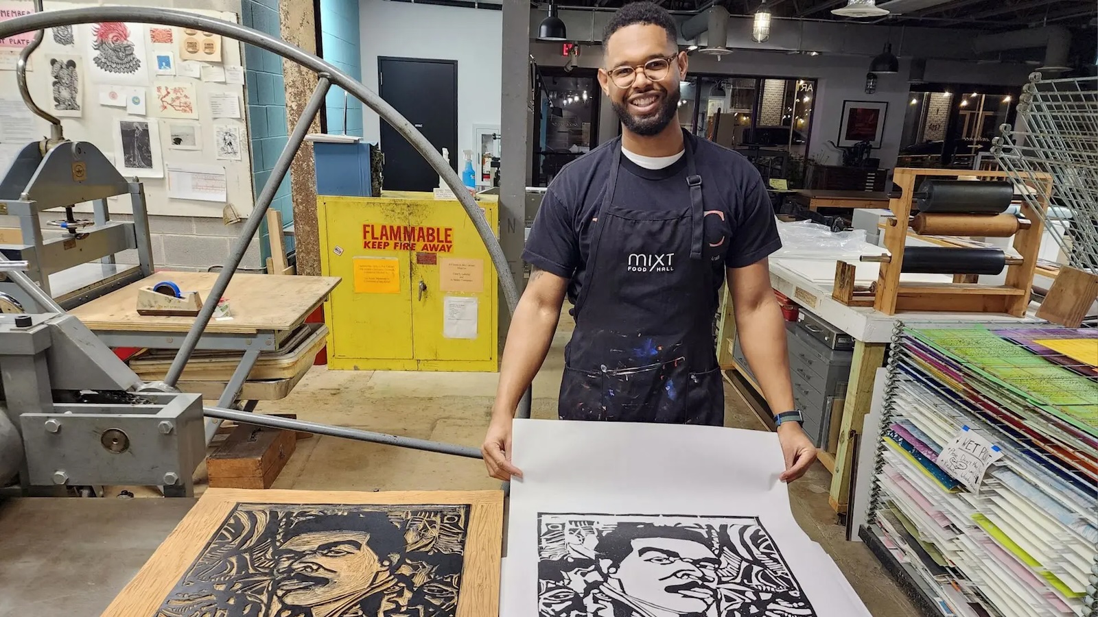 Korey Richardson with David Driskell art