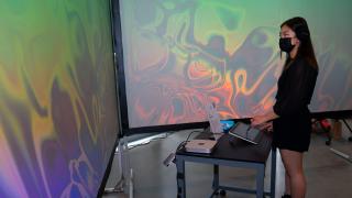 Student displays an immersive media design project